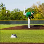 A numbers game: As technology aimed at development of baseball players advances, high school teams in Lawrence accept growing price tag in order to keep up