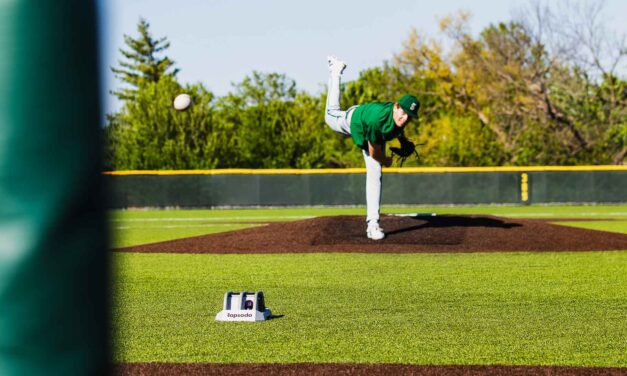 A numbers game: As technology aimed at development of baseball players advances, high school teams in Lawrence accept growing price tag in order to keep up
