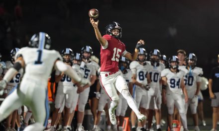 Lawrence High football makes goal-line stand to end Shawnee Mission East comeback attempt, hold on for 35-34 win